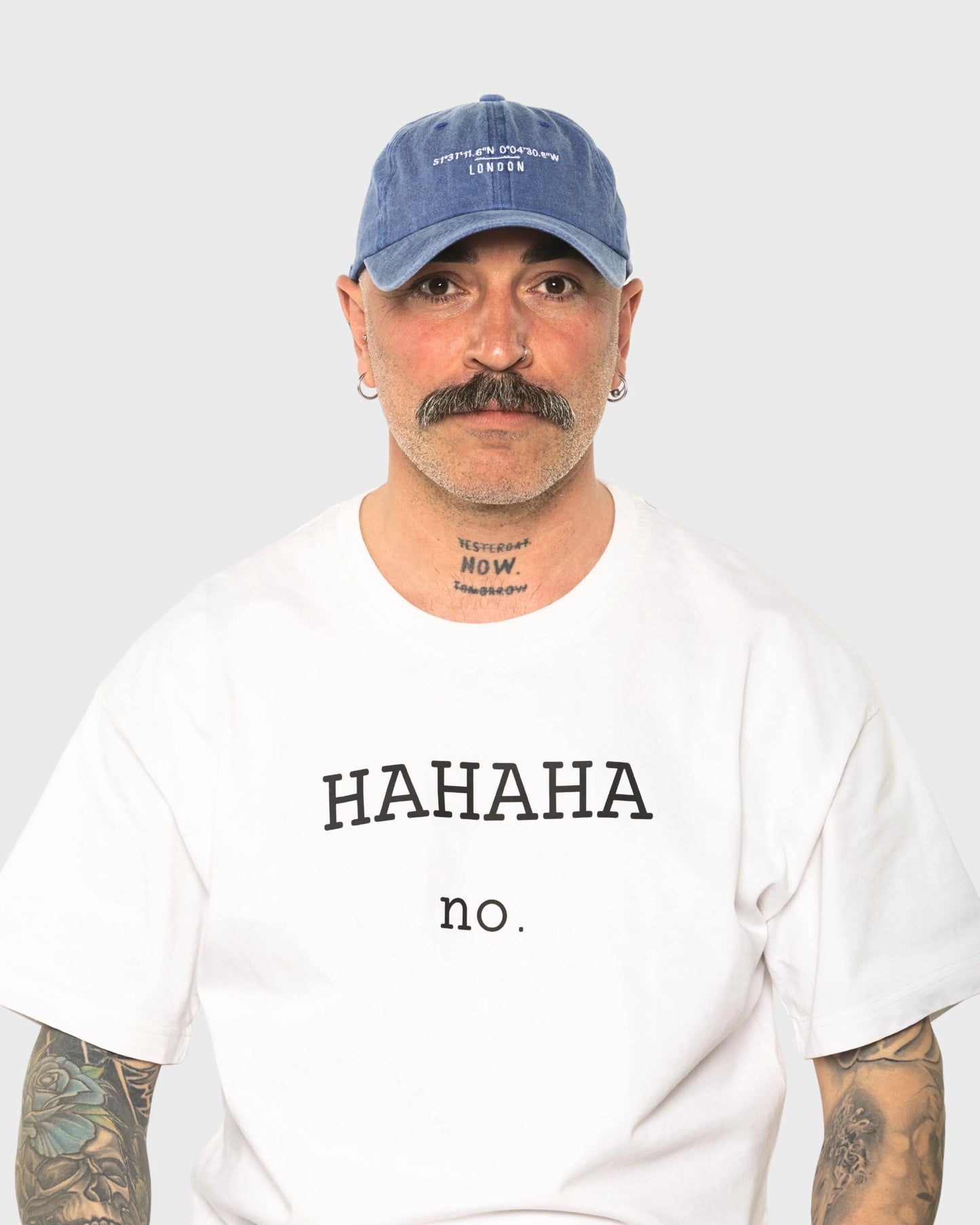 A man wearing the London Blue Washed Cap