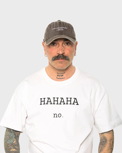 A man wearing the London Dusty Brown Washed Cap