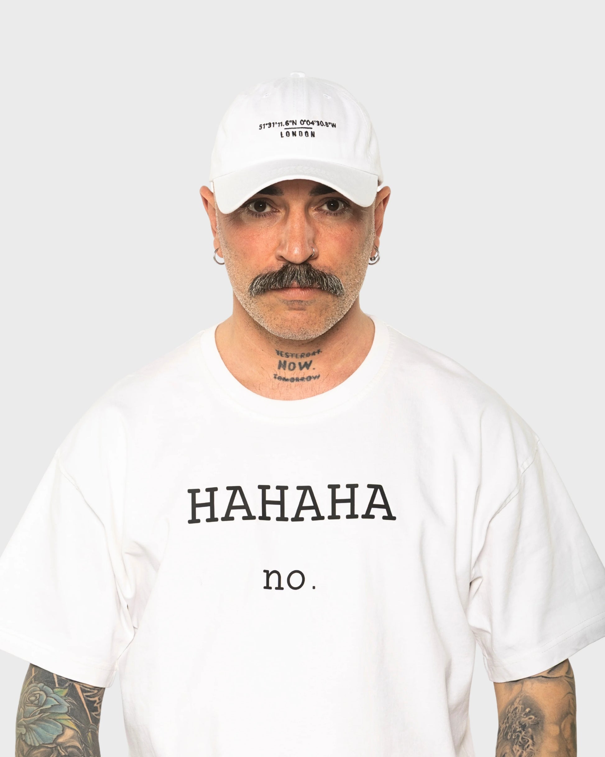 A man wearing the London White Washed Cap