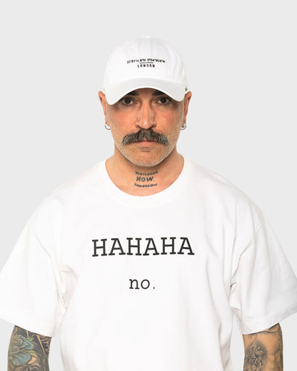 A man wearing the London White Washed Cap