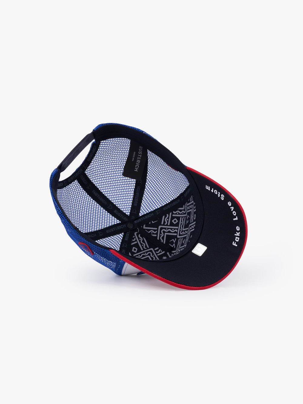 Love Bombing Blue Trucker Hat on a white background