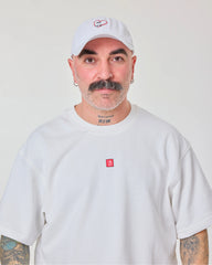 front look of male model wearing love myself embroidered white washed cap