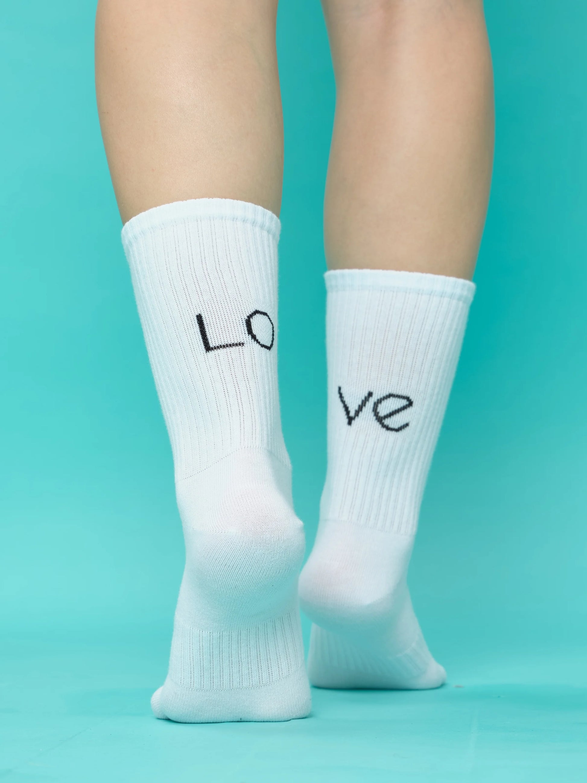 back view of white love socks