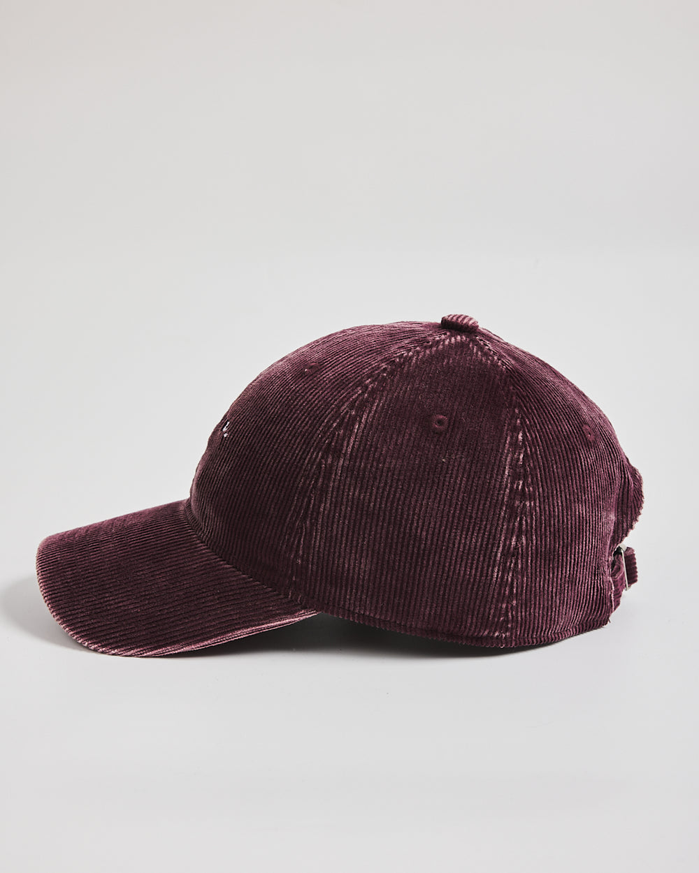 Love You Bye Burgundy Corduroy Caps on a light gray background