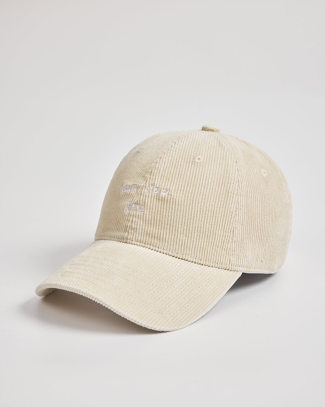 Cream cap on a light gray background