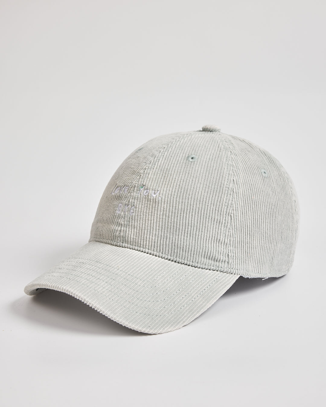 Gray corduroy cap on a light gray background