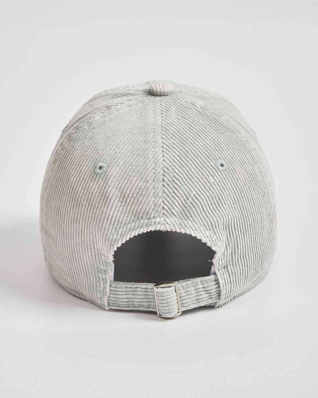 Gray corduroy cap on a white background