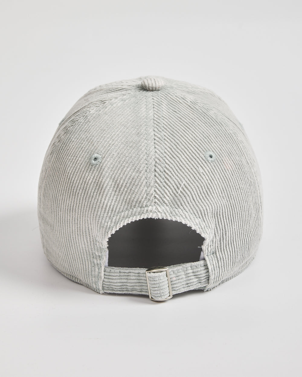 Gray corduroy cap on a white background