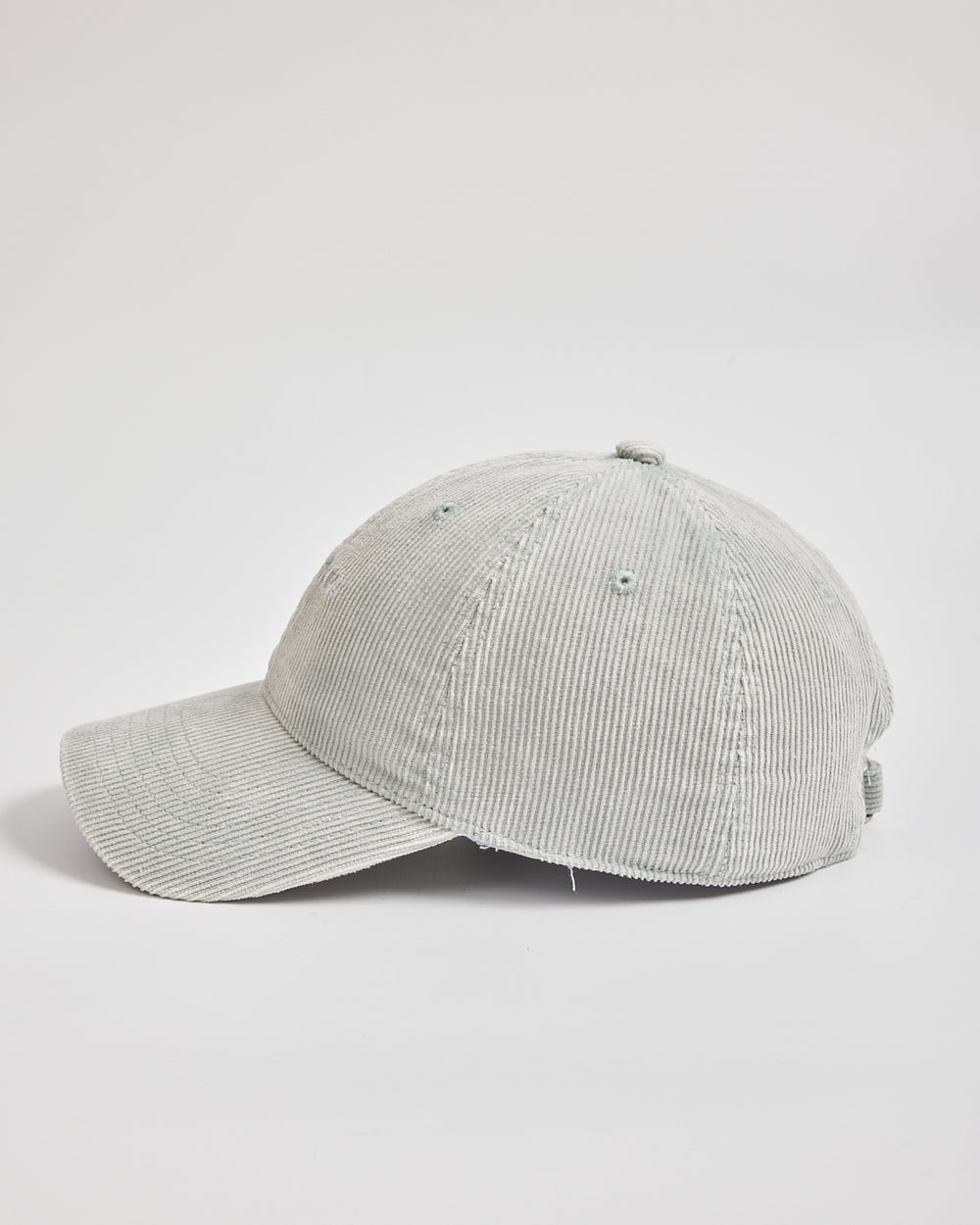 Gray corduroy cap on a light gray background