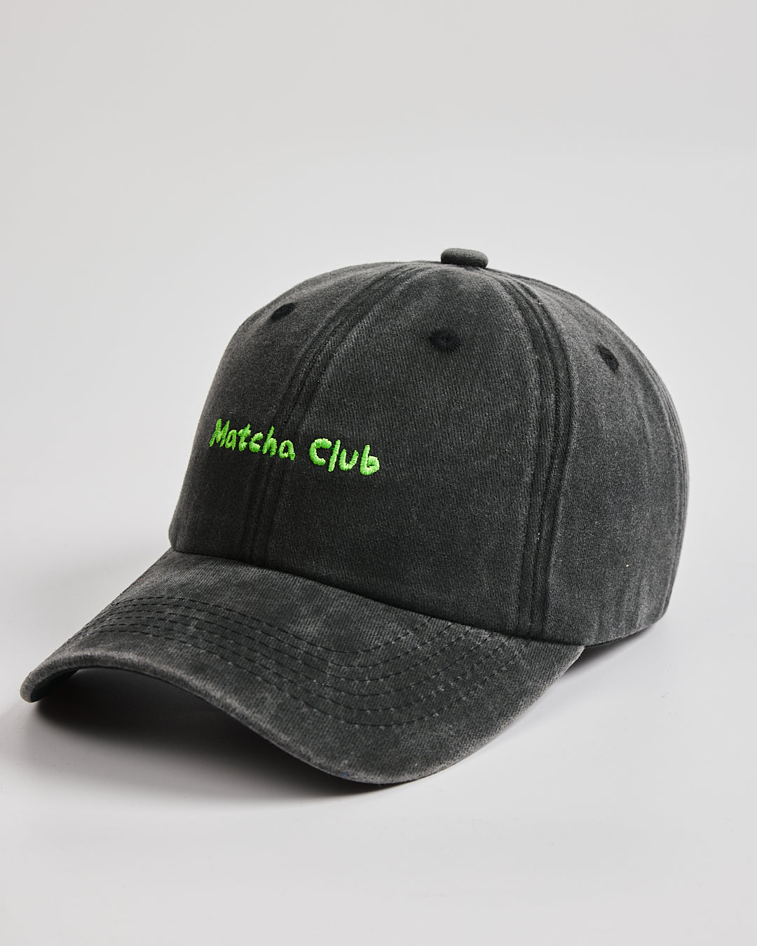 Side view of Matcha Club Black Washed Caps