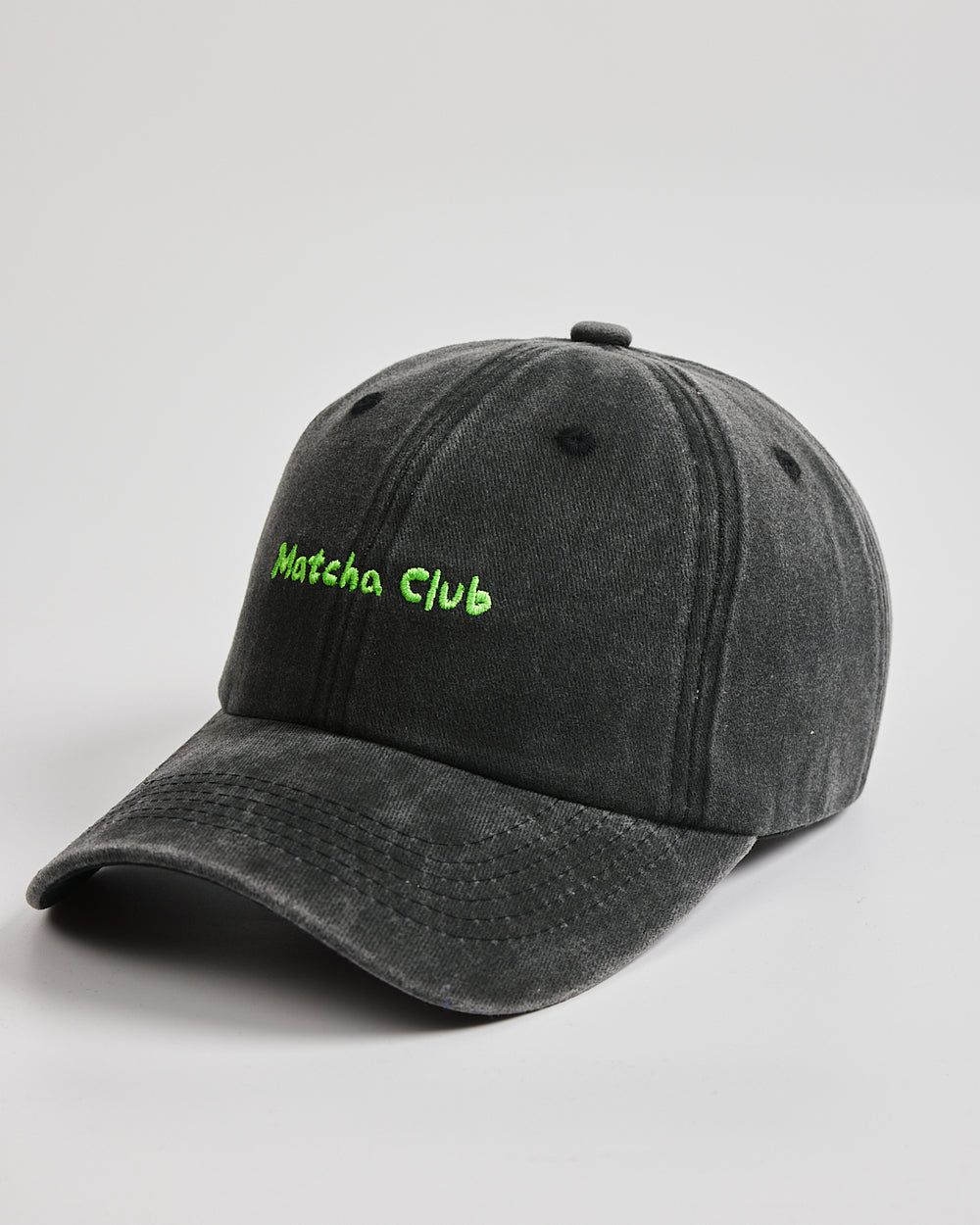 Side view of Matcha Club Black Washed Caps
