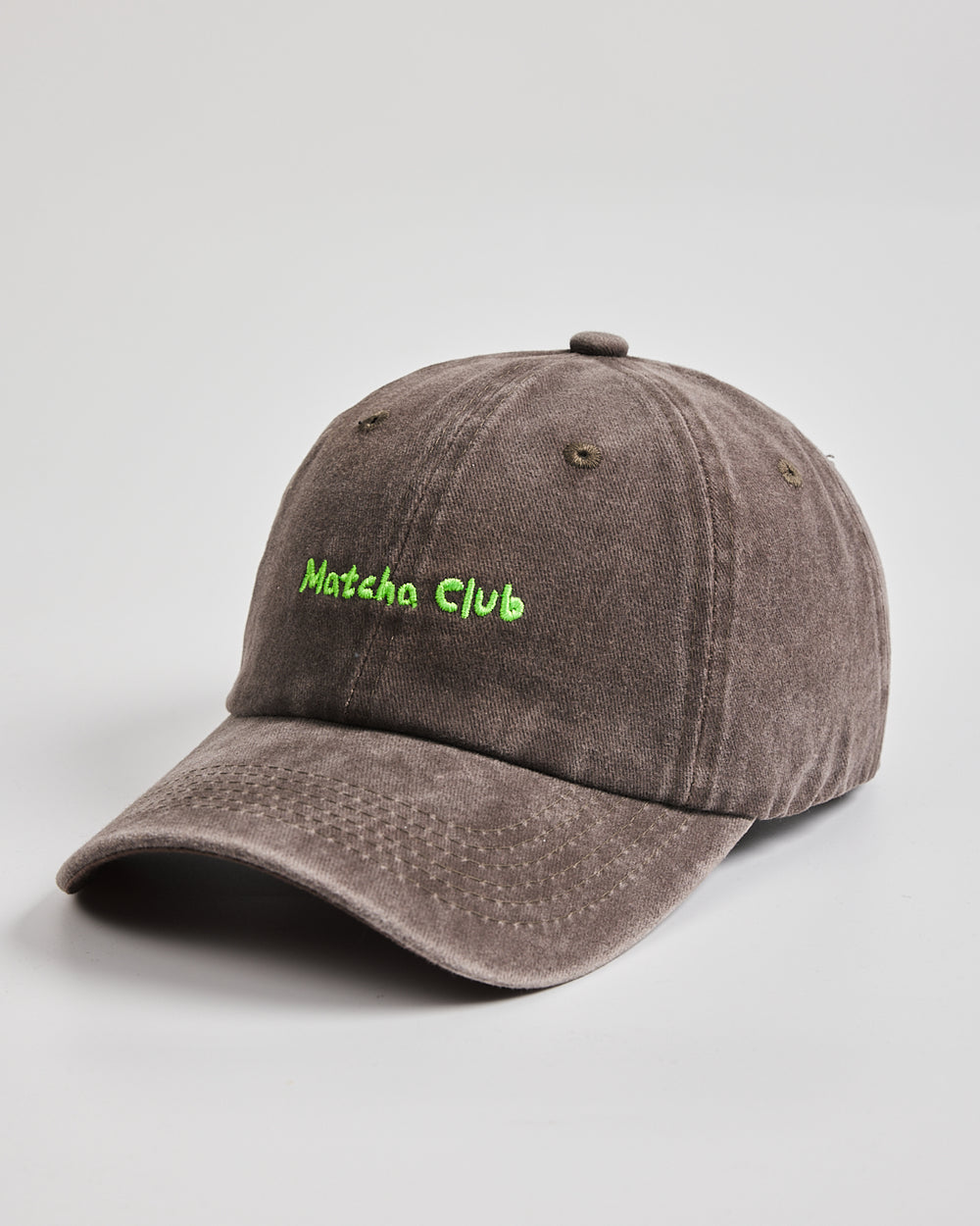 Side view of Matcha Club Brown Washed Caps