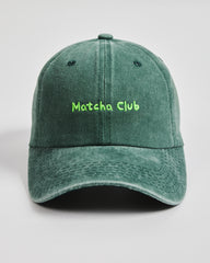 Front view of Matcha Club Dark Green Washed Cap