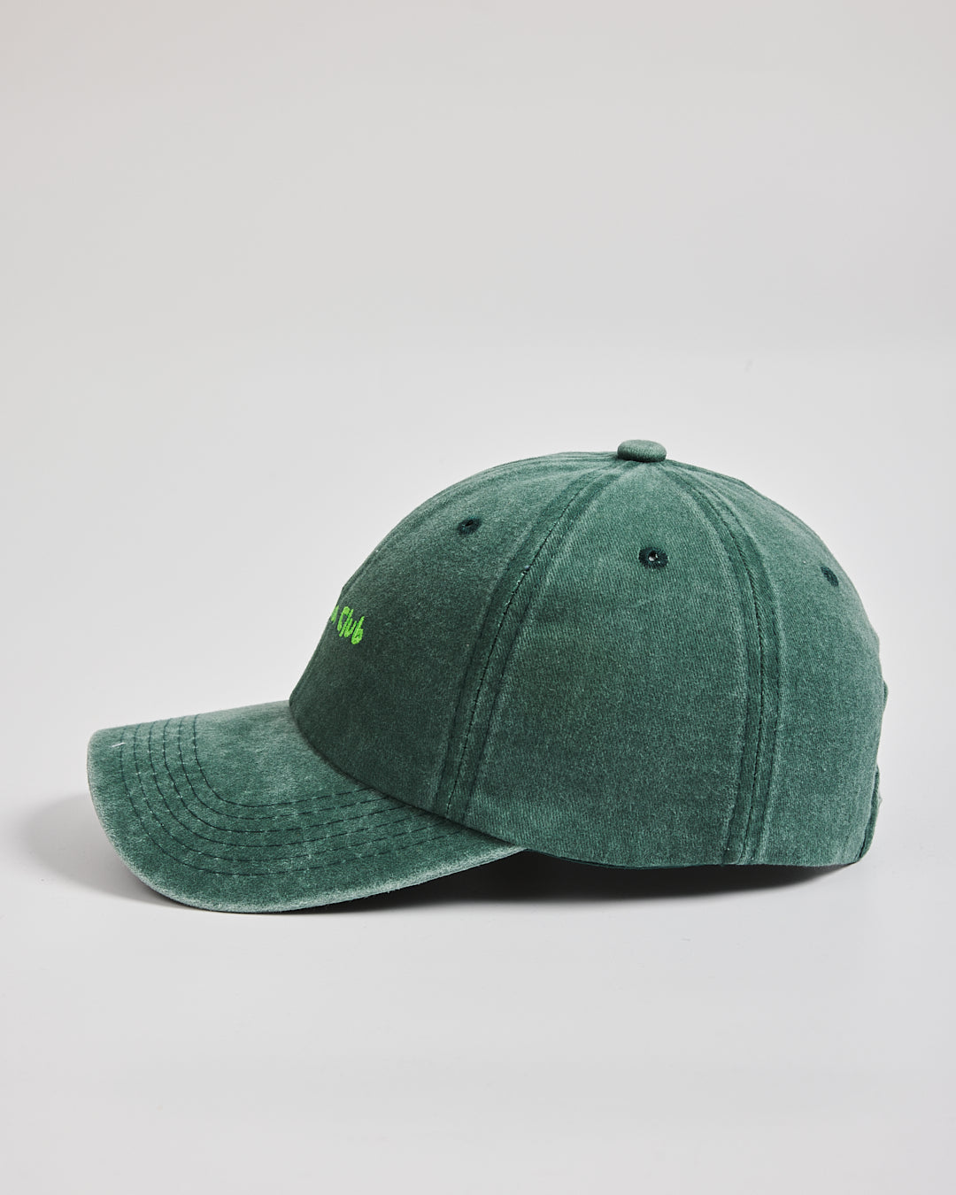 Matcha Club Dark Green Washed Cap on a light gray background