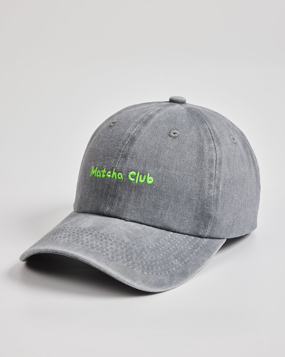 Side view of Matcha Club Grey Washed Cap