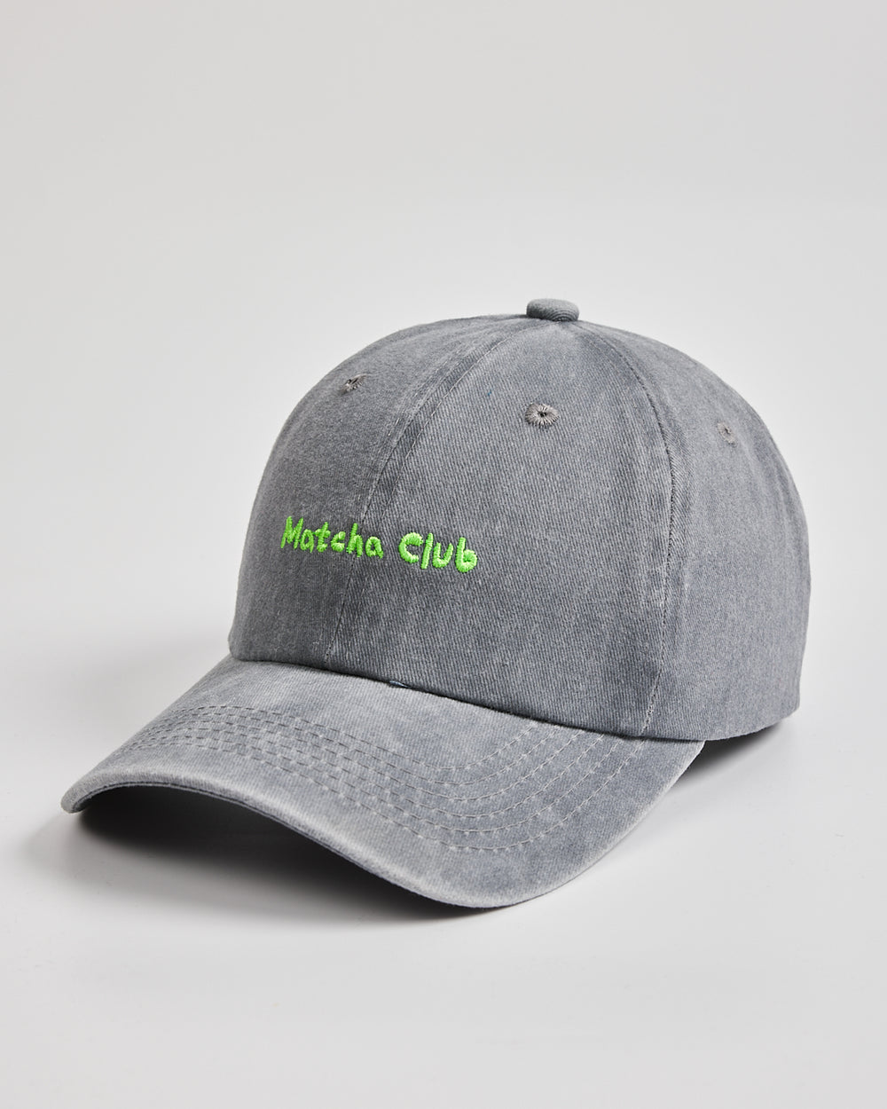 Side view of Matcha Club Grey Washed Cap