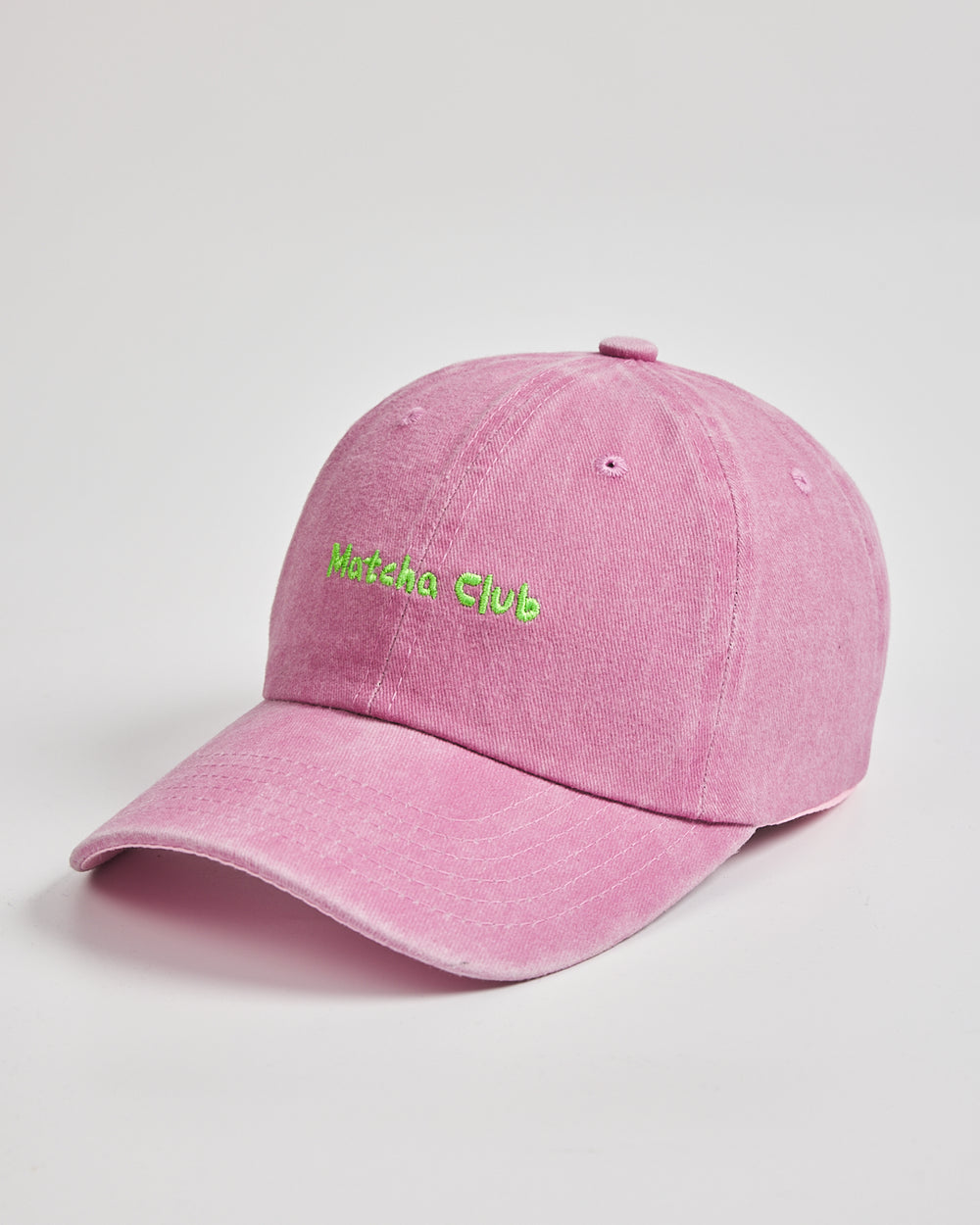 Side view of Matcha Club Pink Washed Caps