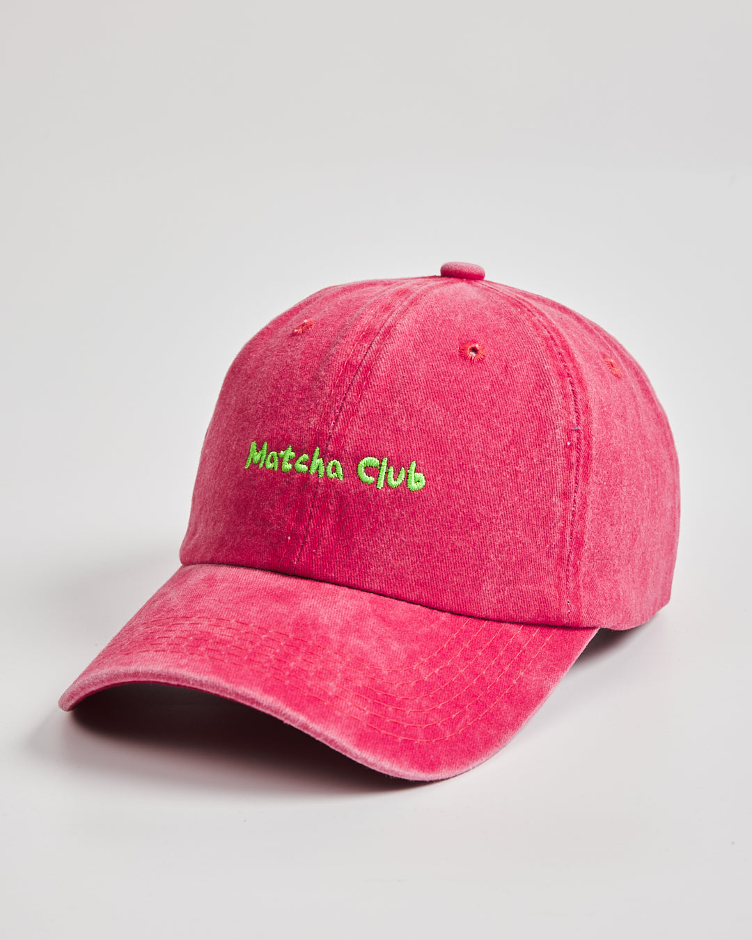 Side view of Matcha Club Red Washed Caps