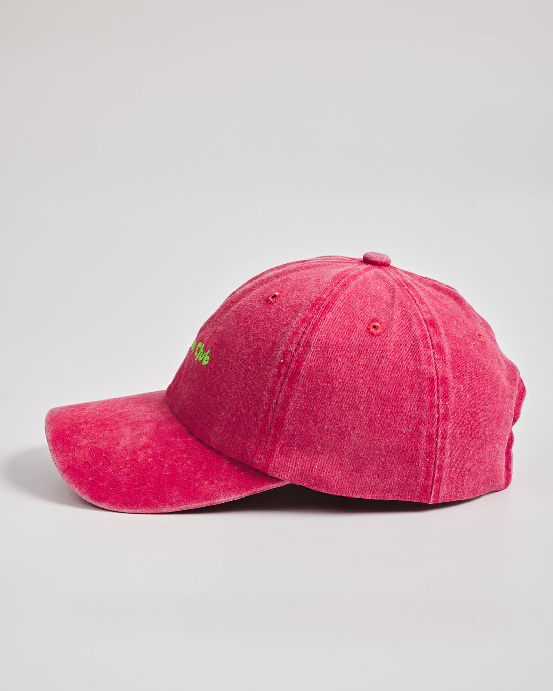 Matcha Club Red Washed Caps on a light gray background