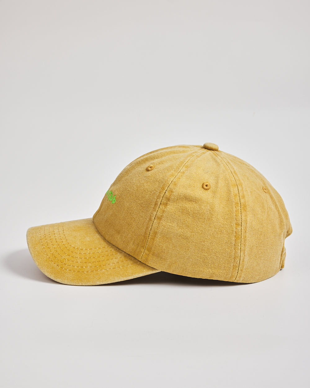 Matcha Club Mustard Yellow Washed Cap on a light gray background