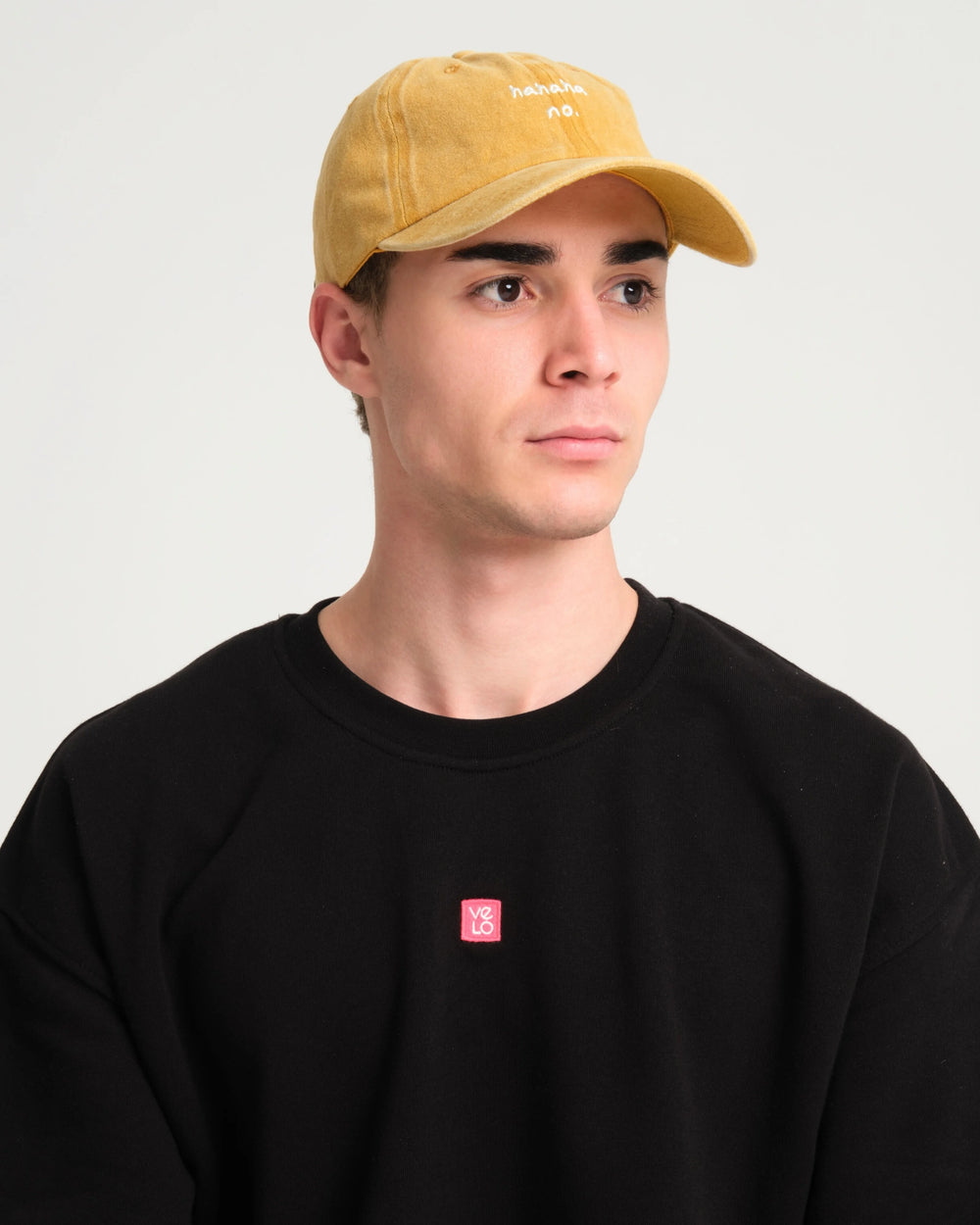 man wearing Mustard Hahaha No Washed Cap