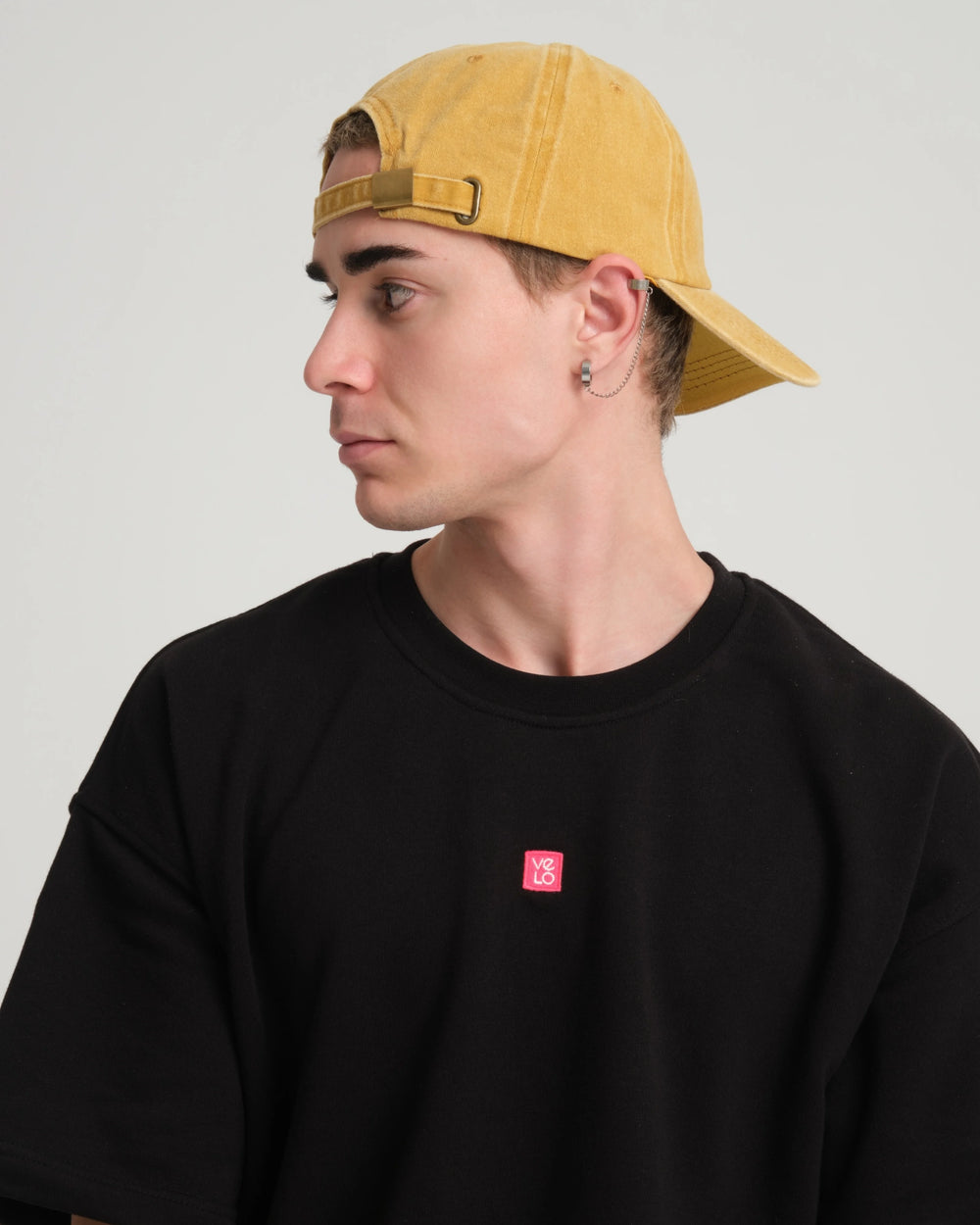 man wearing back side of Mustard Hahaha No Washed Cap
