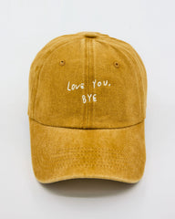 front view of Love You Bye Mustard Washed Cap