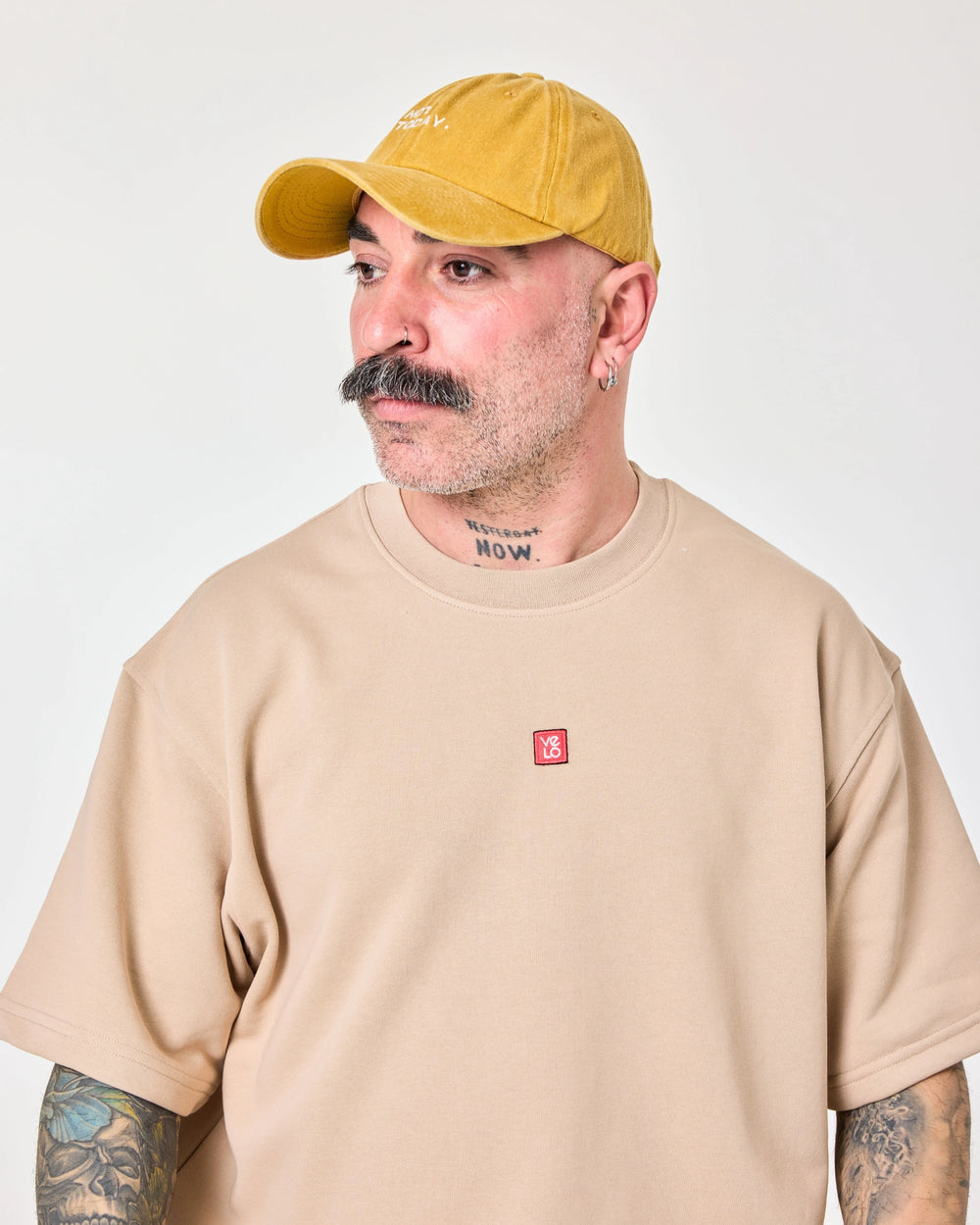 man wearing Mustard Washed Cap with Not Today embroidered in white