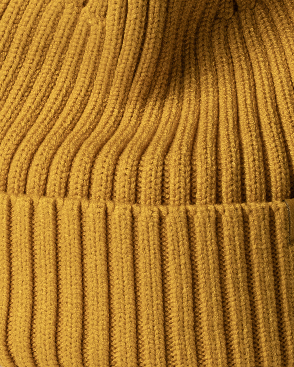 Close view of Mustard Yellow Classic Beanie