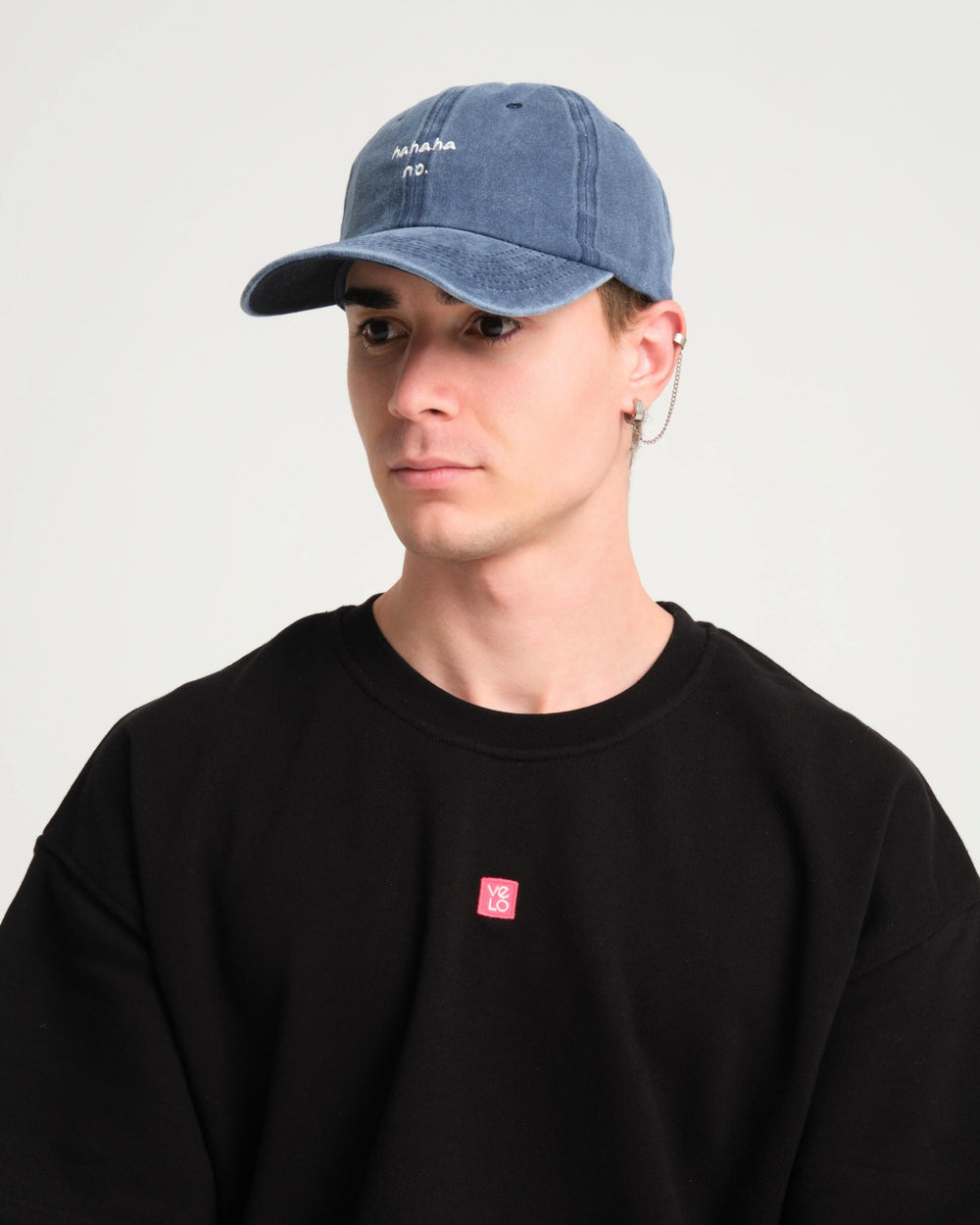 man wearing Navy Blue Hahaha No Washed Cap