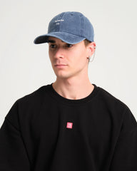 man wearing Navy Blue Hahaha No Washed Cap