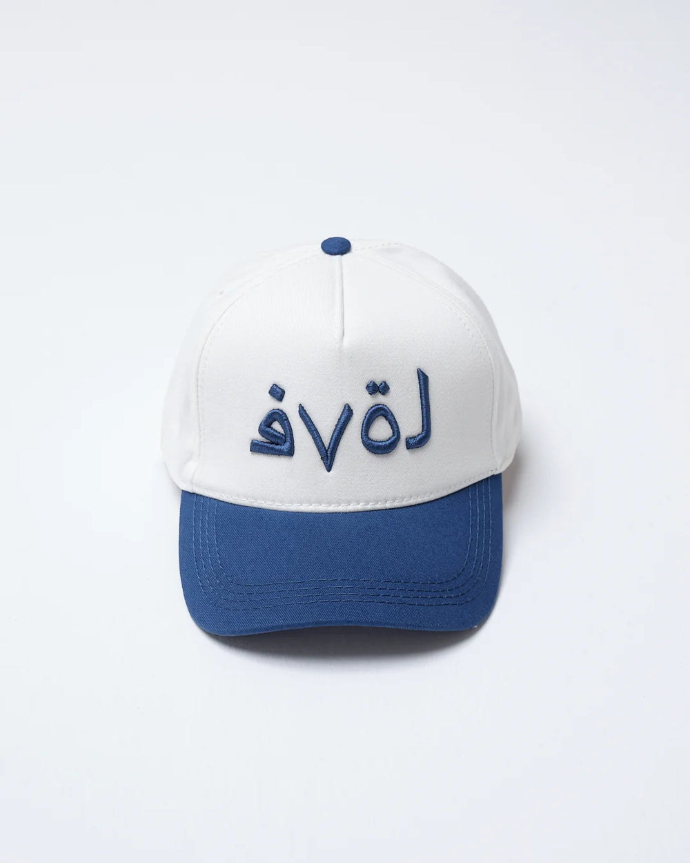 navy love written baseball cap on a white background