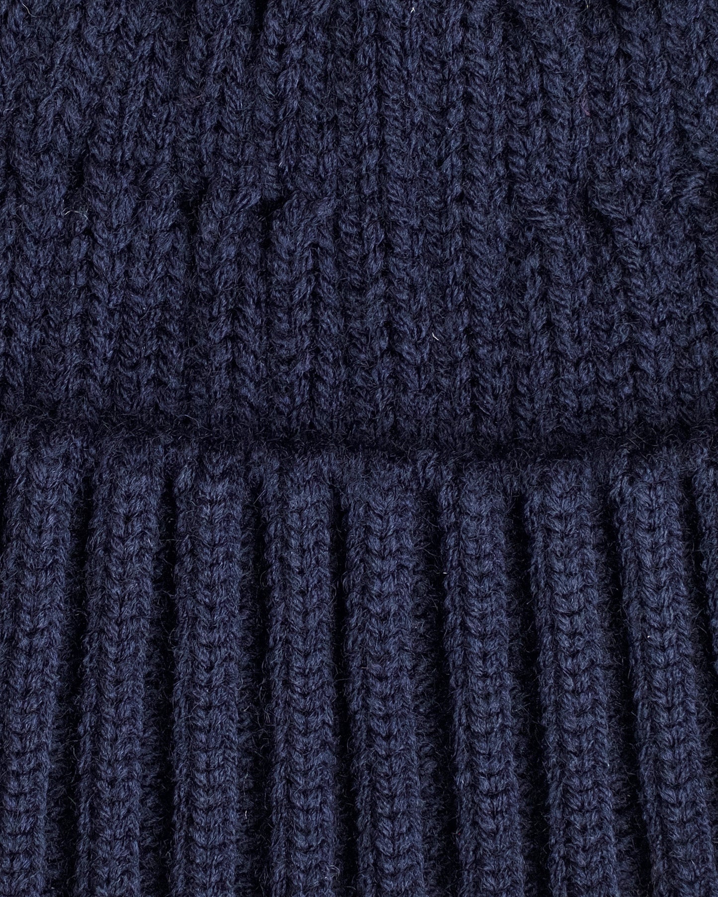 close look of navy fisherman beanie 