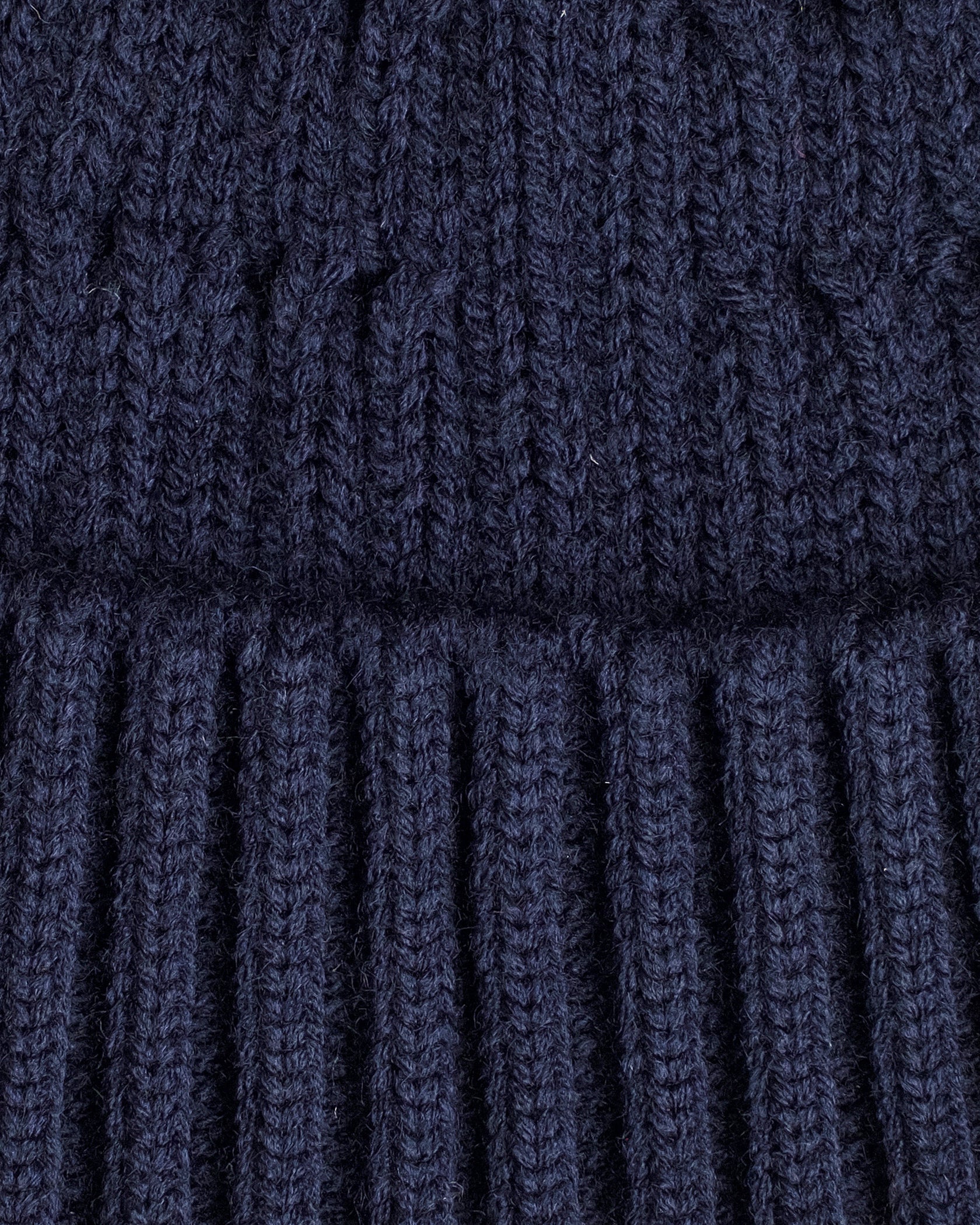 close look of navy fisherman beanie 
