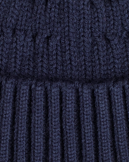close look of navy fisherman beanie 