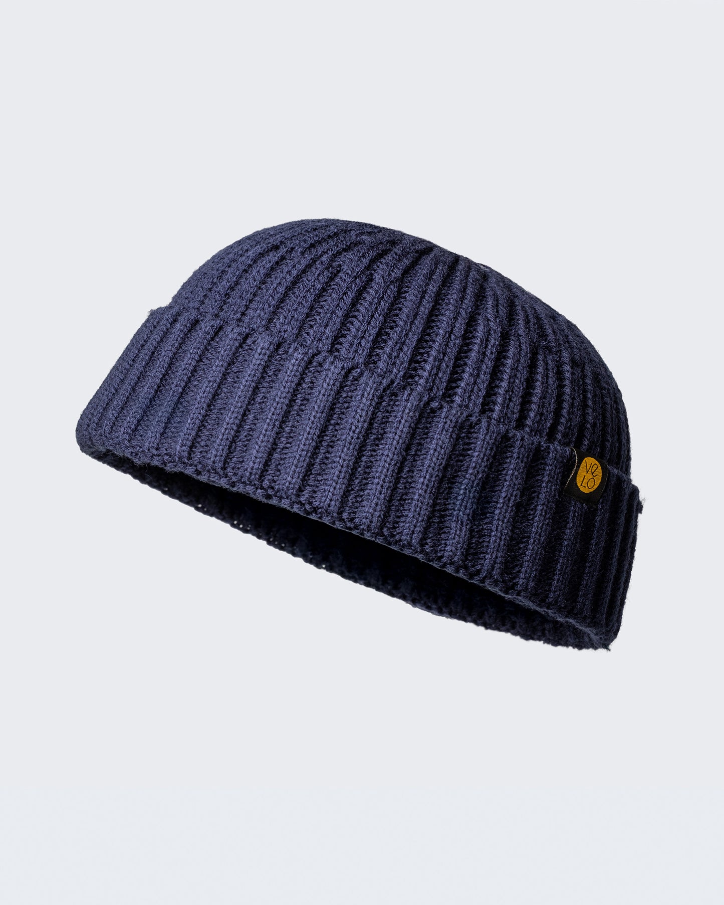navy fisherman beanie product photo on a white background