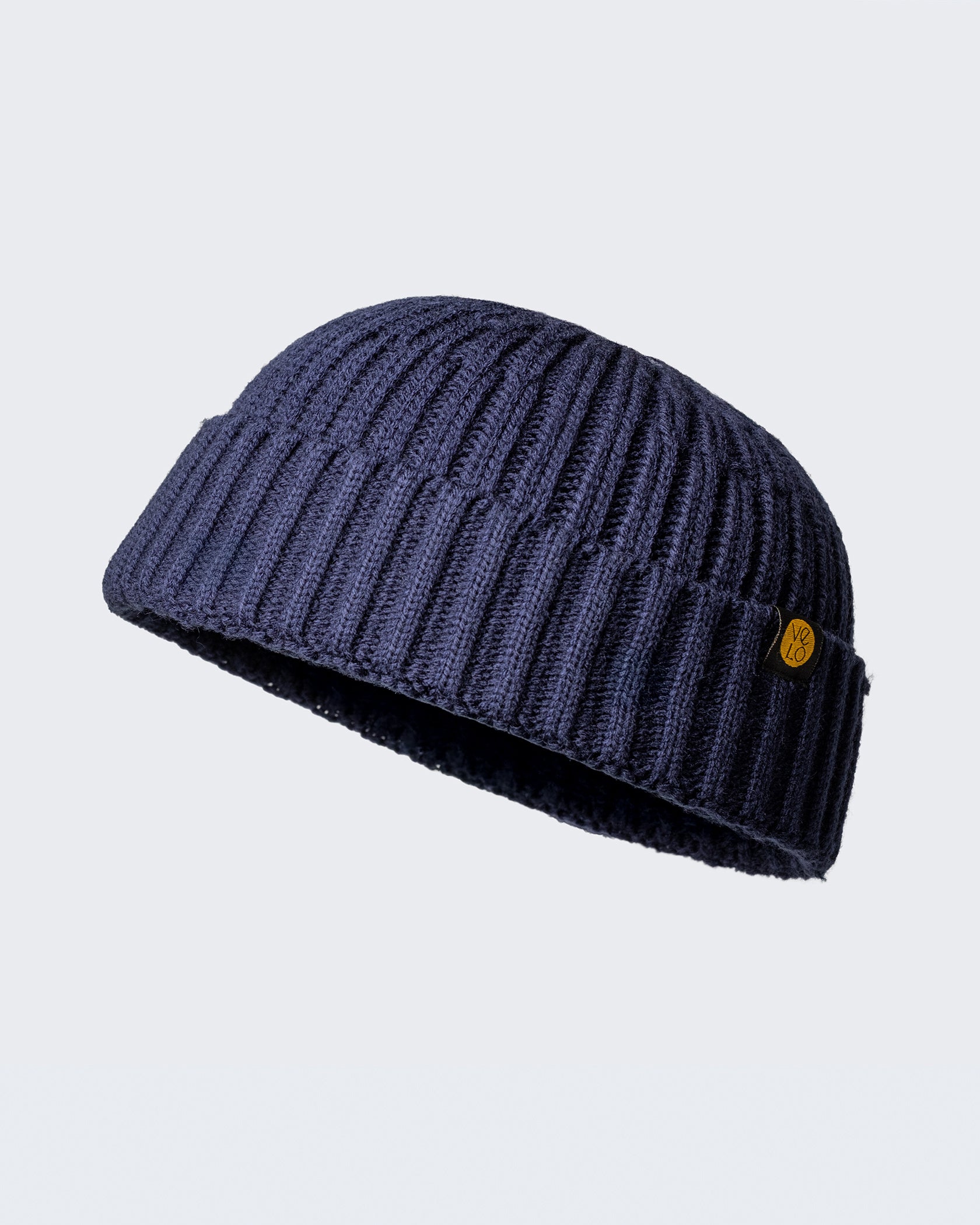 navy fisherman beanie product photo on a white background