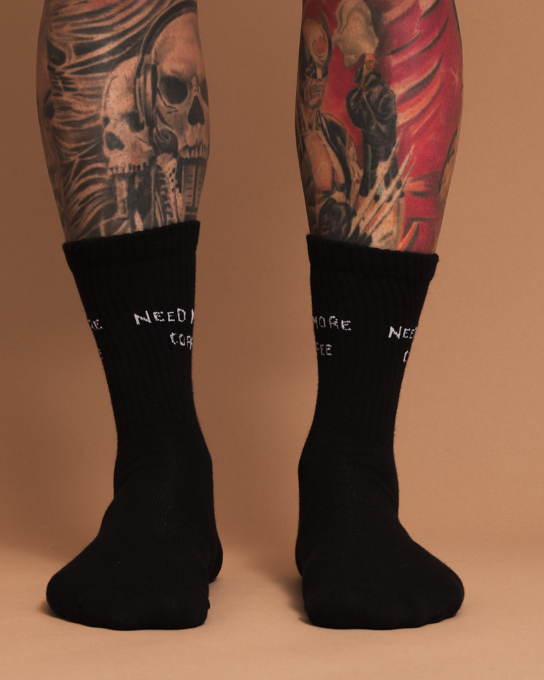 Front view of Need More Coffee Black Socks