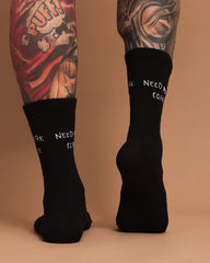 Back view of Need More Coffee Black Socks