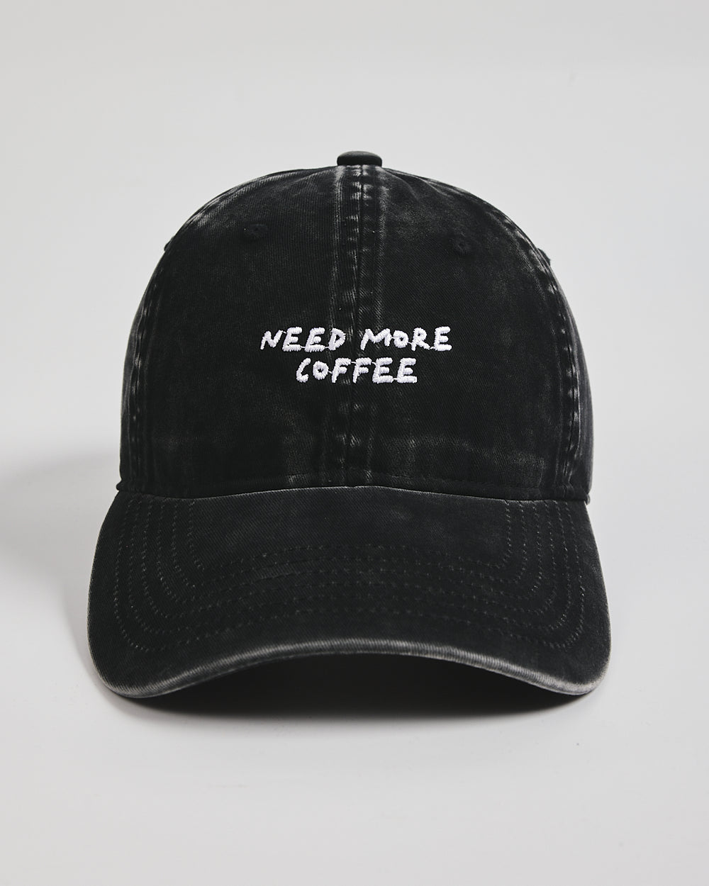 Front view of Need More Coffee Black Washed Cap
