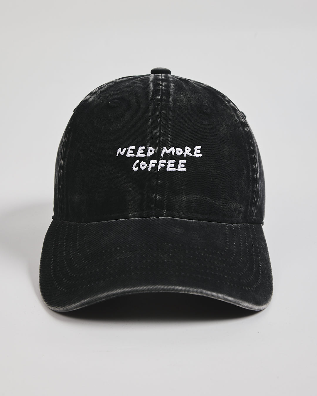 Front view of Need More Coffee Black Washed Cap