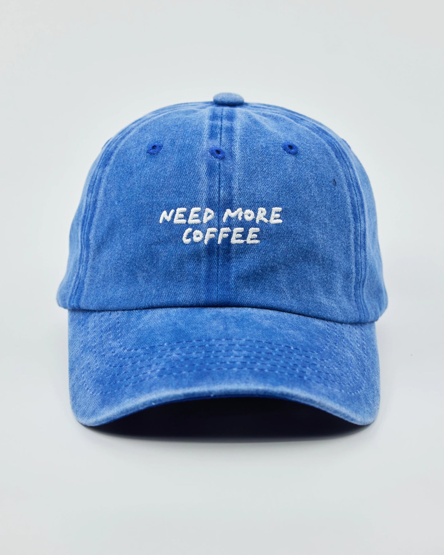 Front view of Need More Coffee Blue Washed Cap