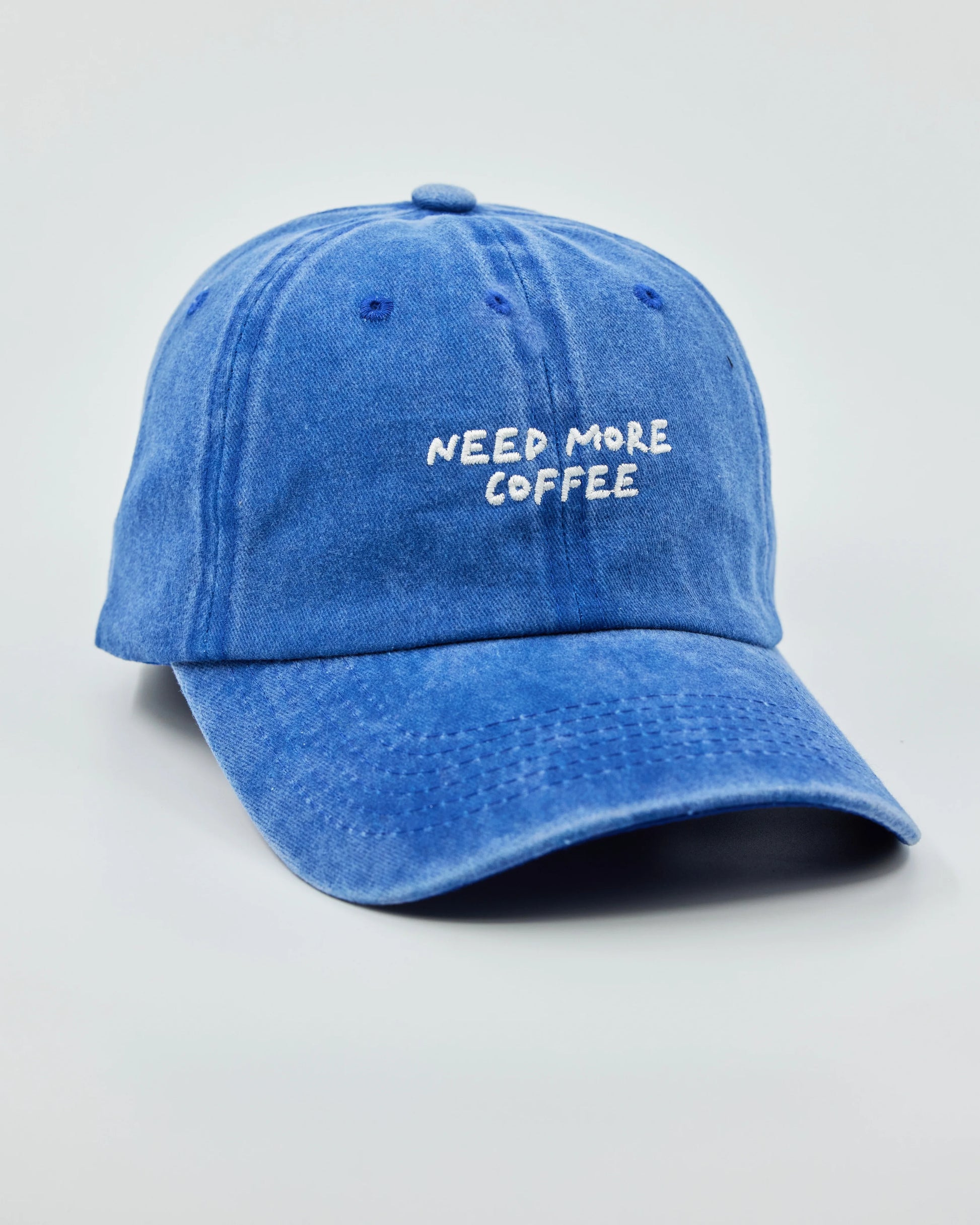Side view of Need More Coffee Blue Washed Cap