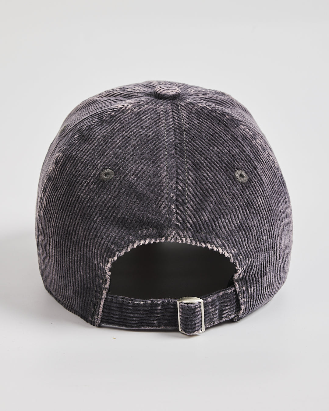 Gray corduroy cap on a light gray background