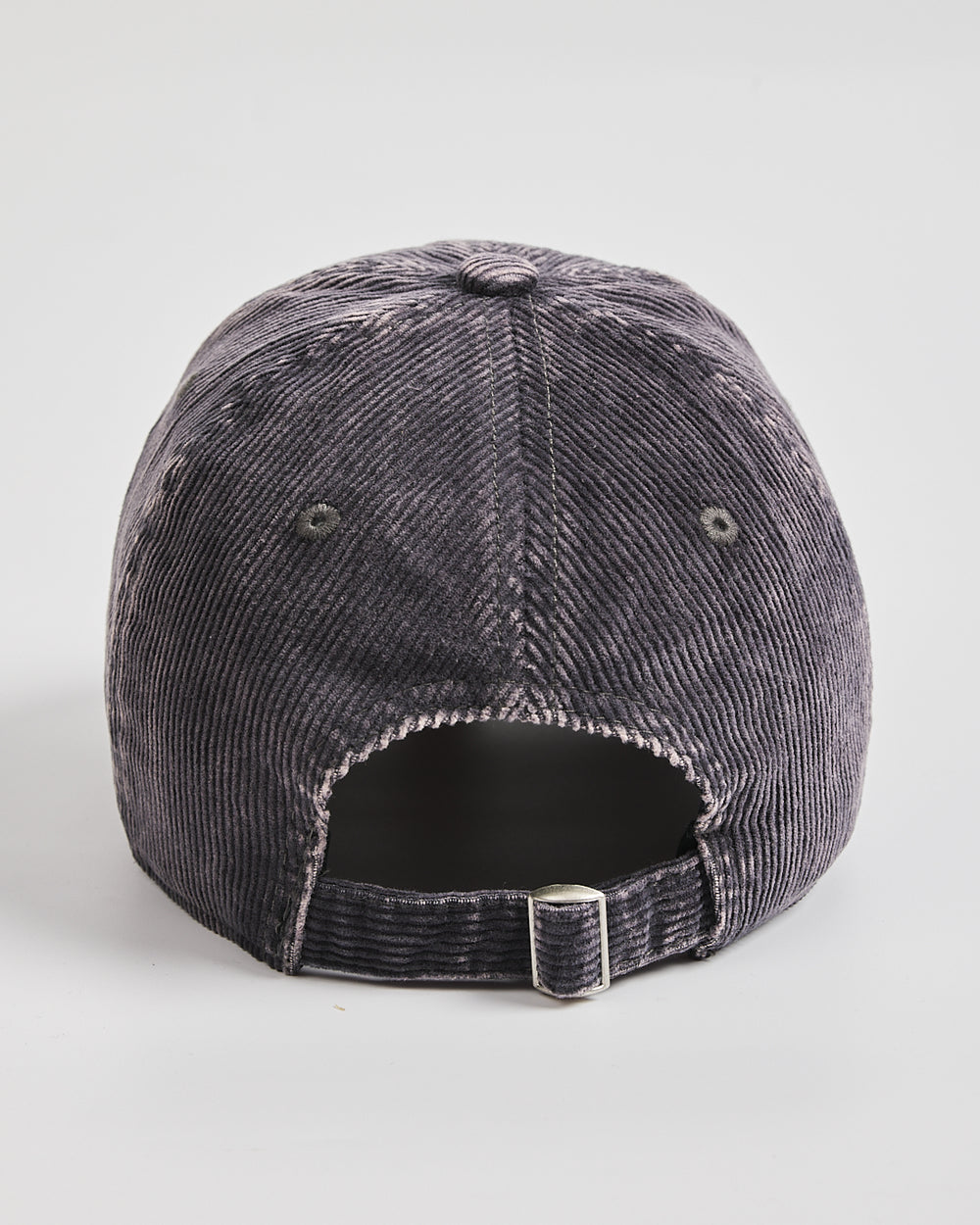 Gray corduroy cap on a light gray background