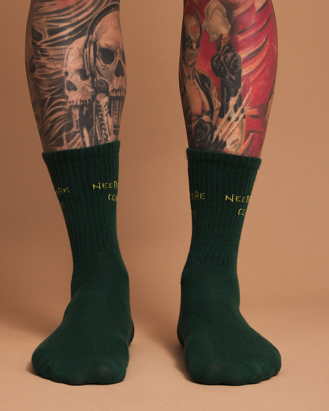 Front view of Need More Coffee Dark Green Socks