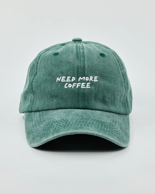 Front view of Need More Coffee Dark Green Washed Cap