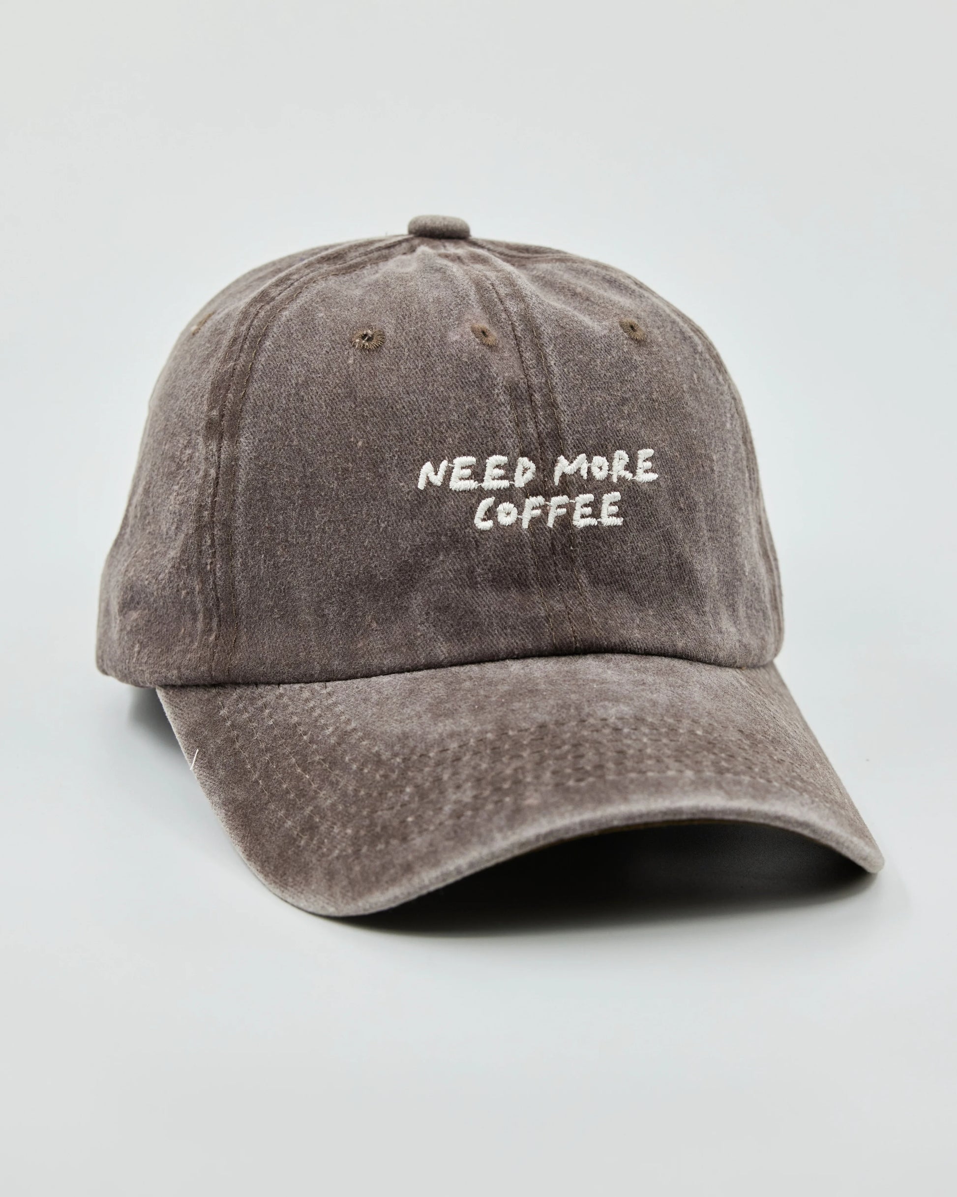 Side view of Need More Coffee Dusty Brown Washed Cap