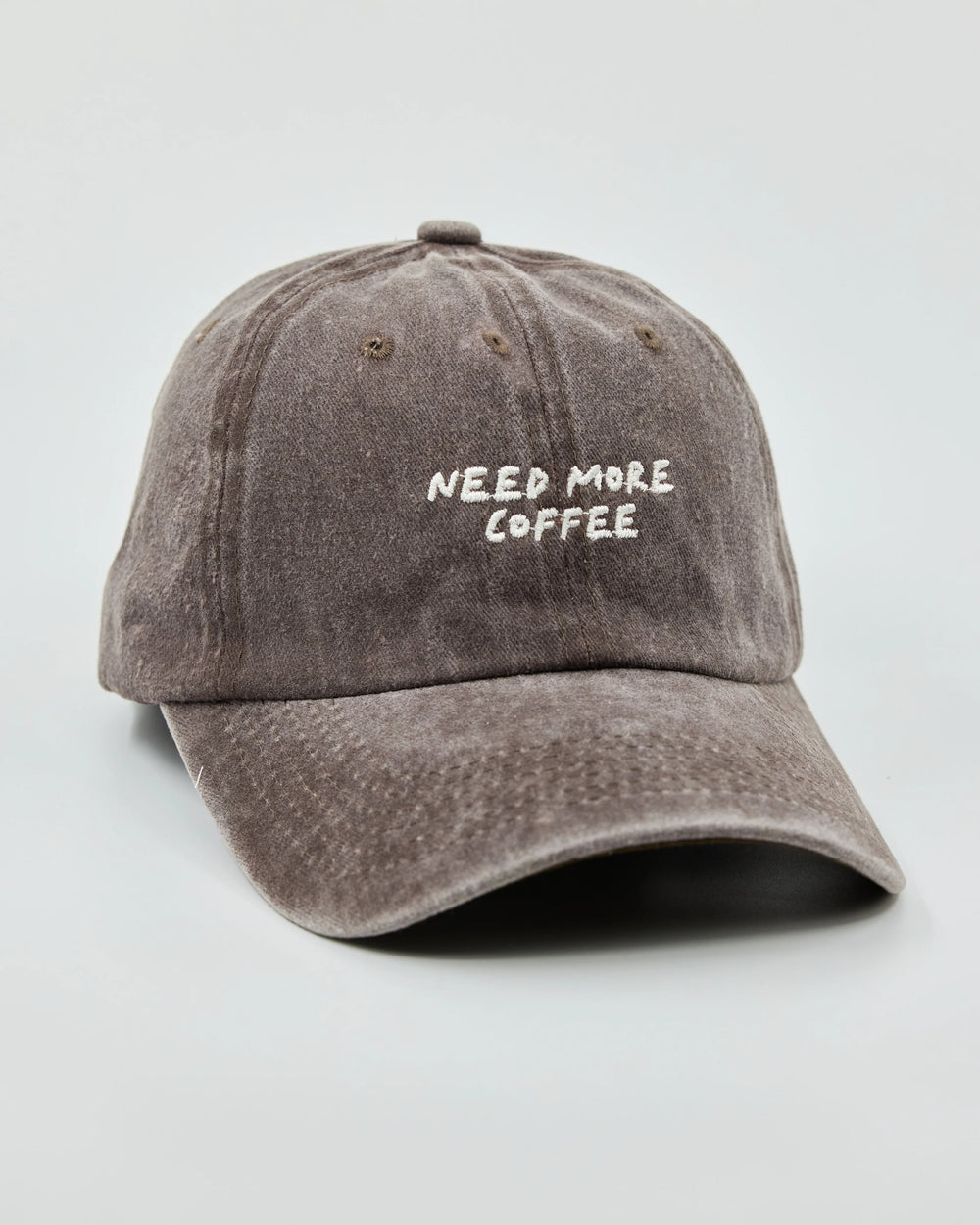 Side view of Need More Coffee Dusty Brown Washed Cap