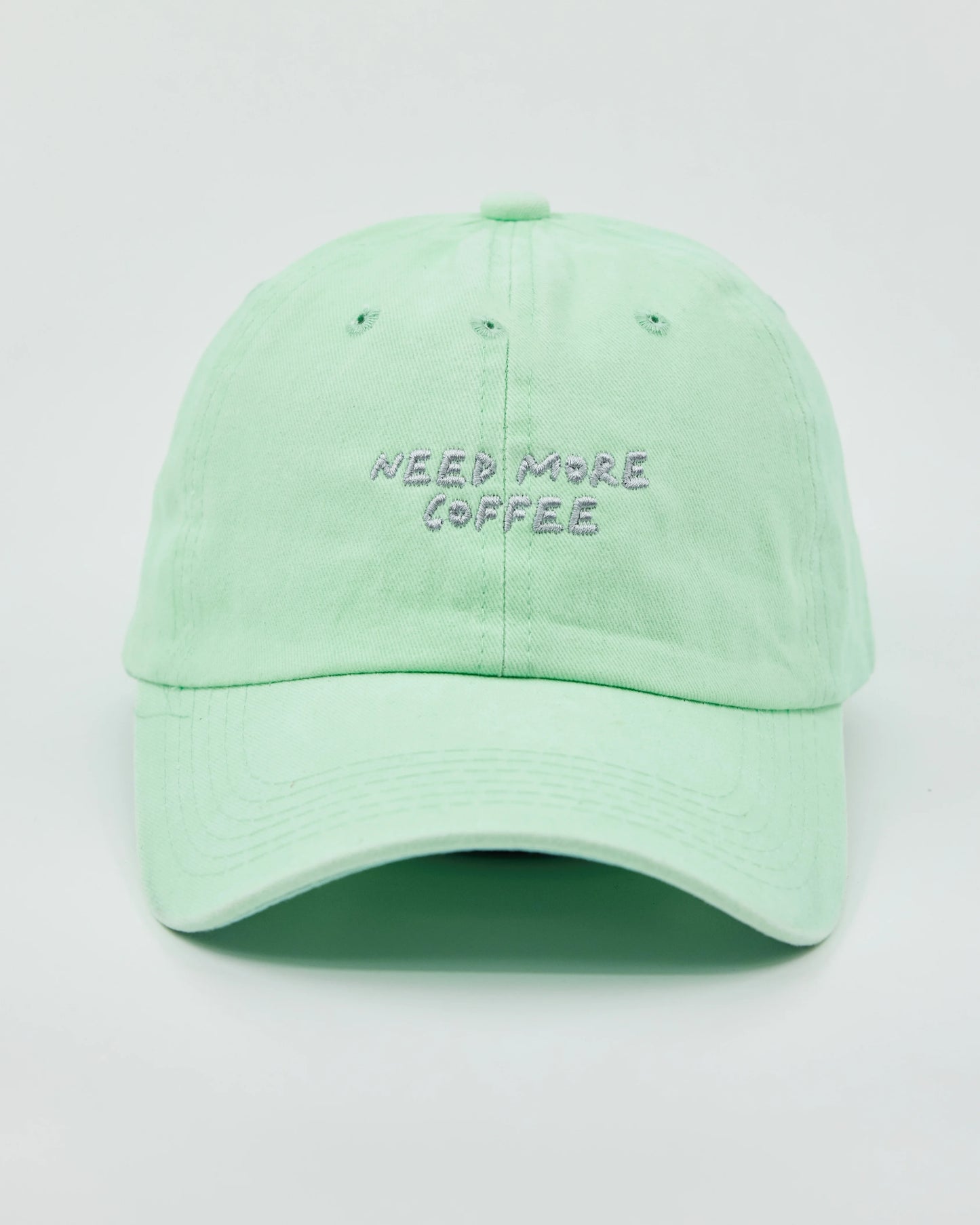 Front view of Need More Coffee Light Green Washed Cap